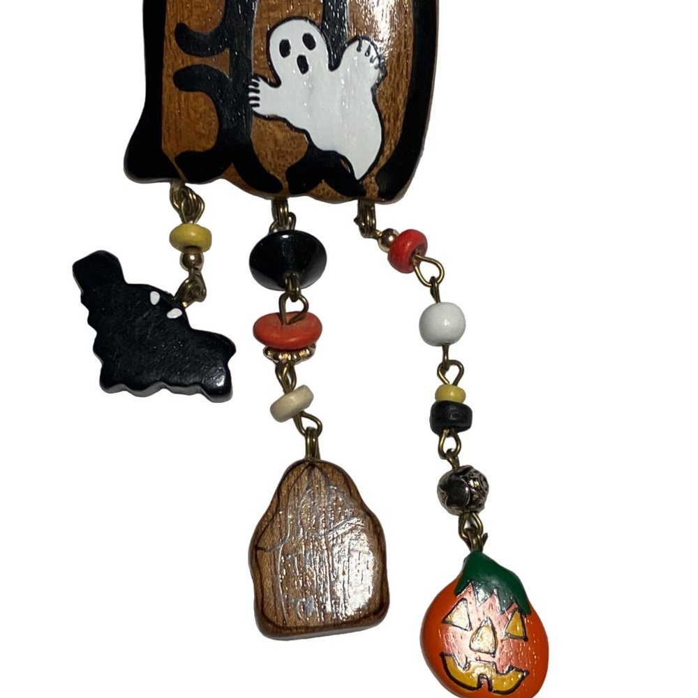 Halloween “BOO” has  Pin with Dangling Charms